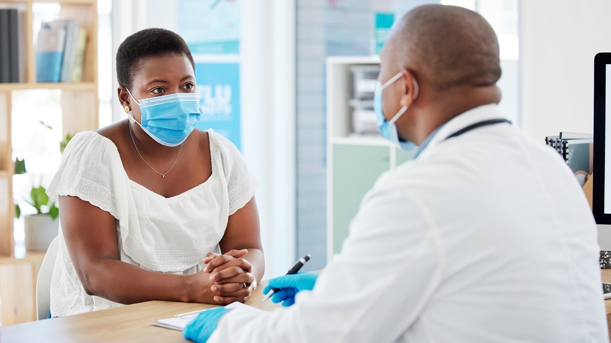 a woman talking to her doctor