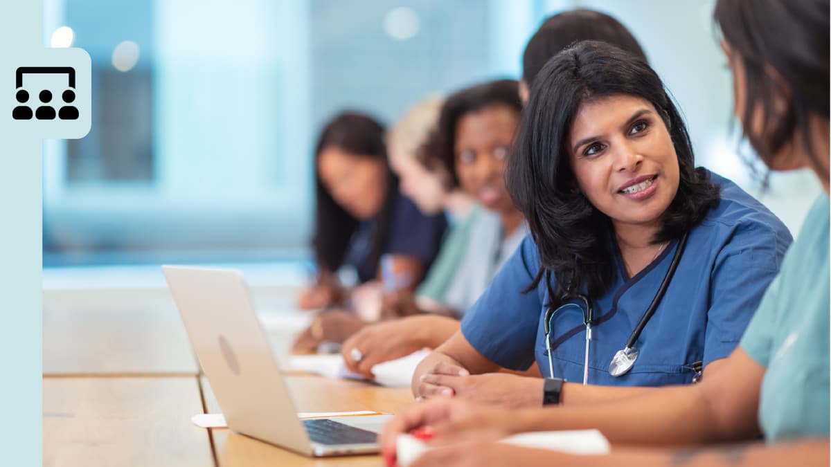 A group of healthcare professionals in a meeting.