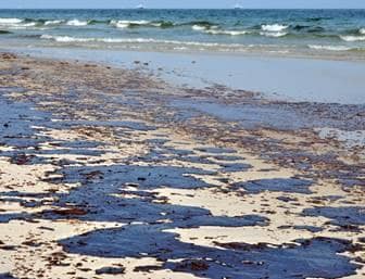 Oil slick on top of water.