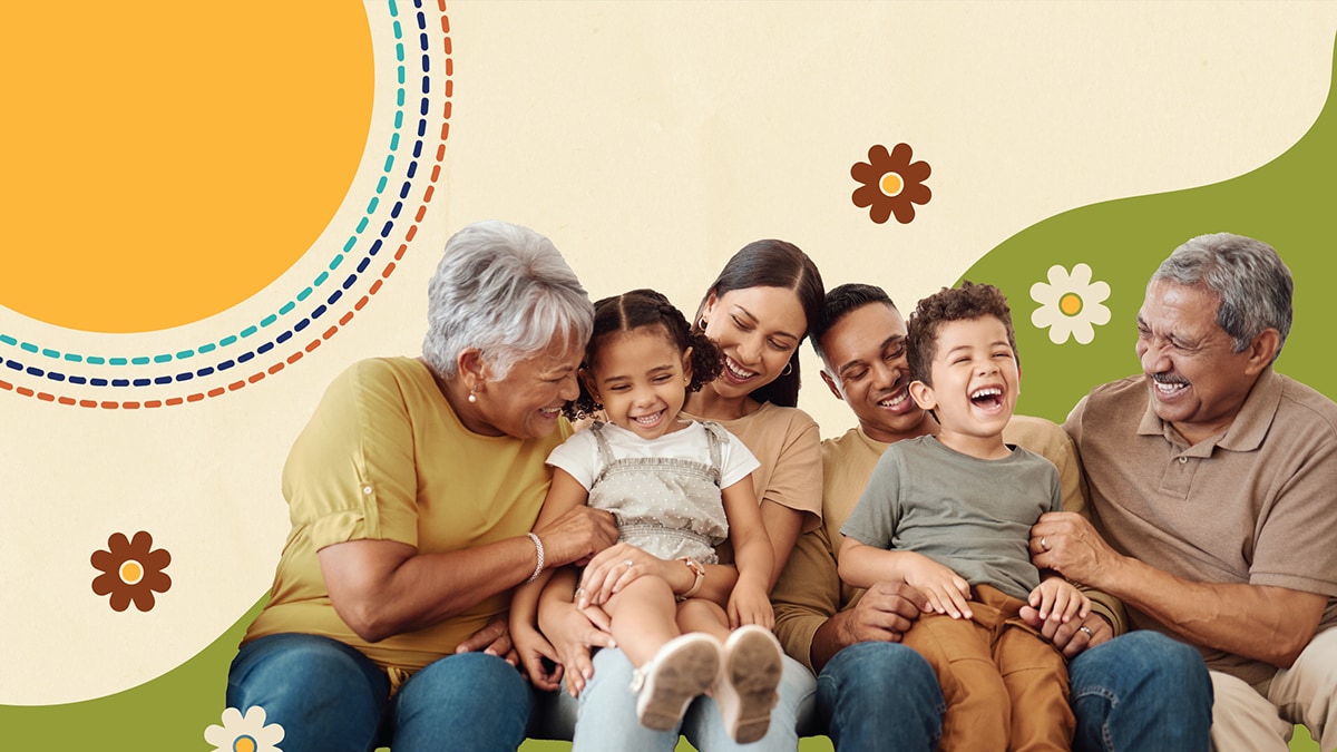 A inter-generational family sits and laughs together