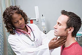 Doctor examining patient