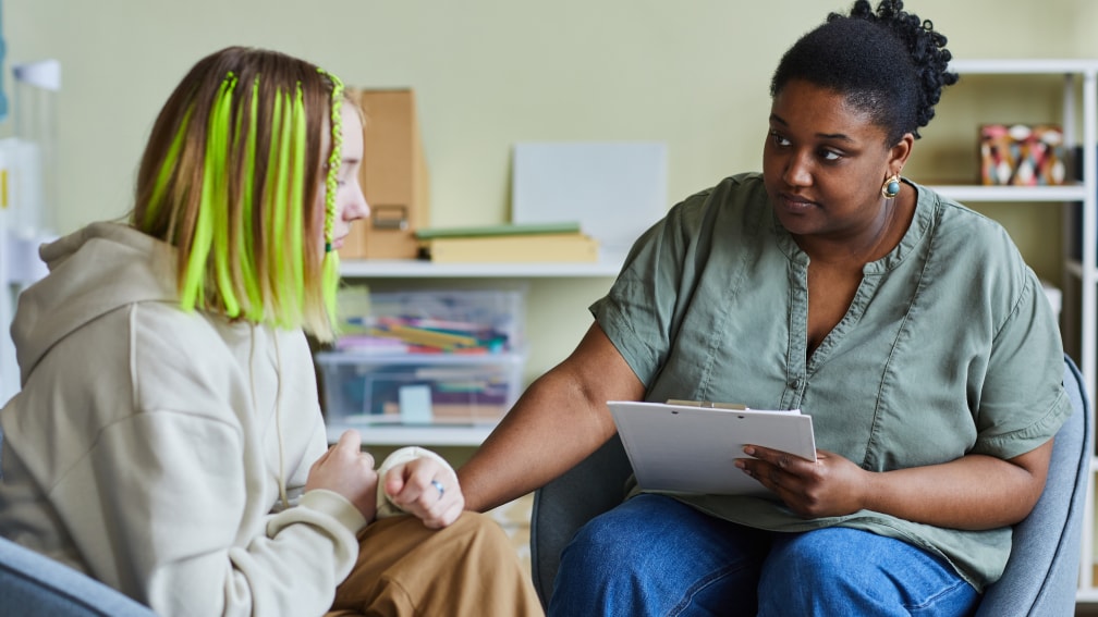 school nurse counseling teenage girl