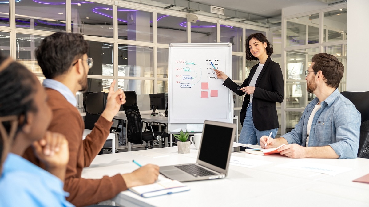 conference group with whiteboard