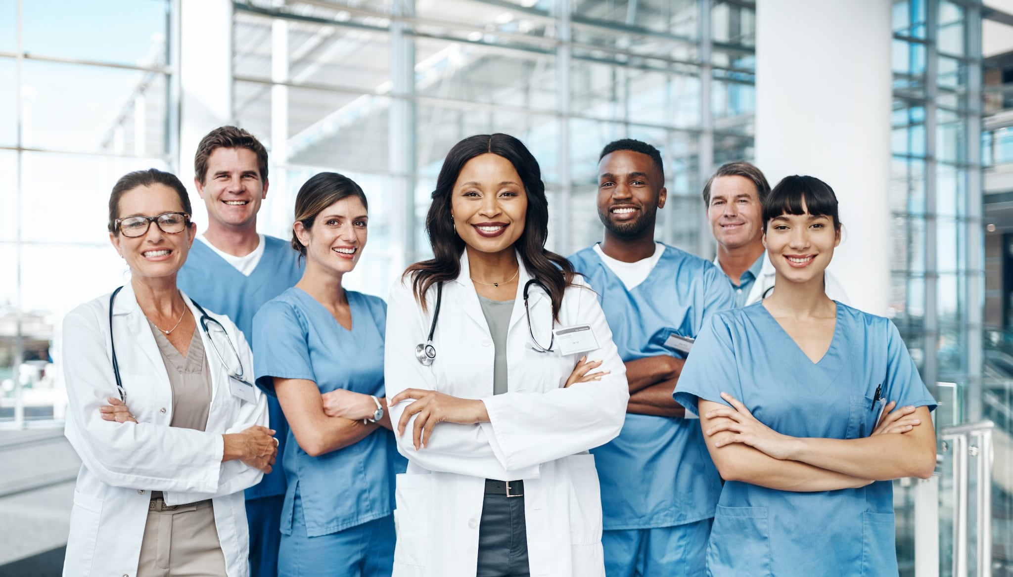 Group of clinicians with their arms crossed.