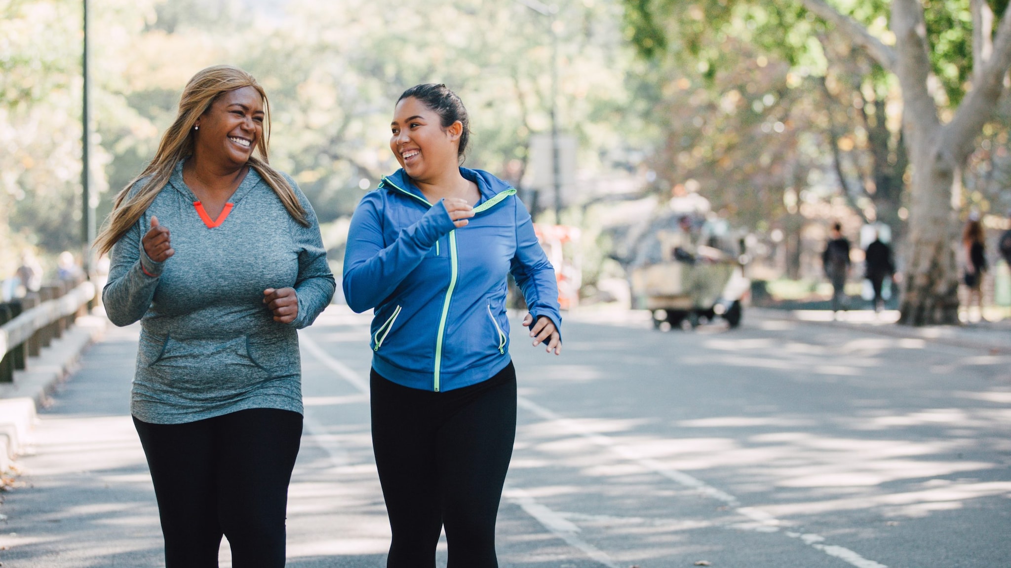 Two women walking.