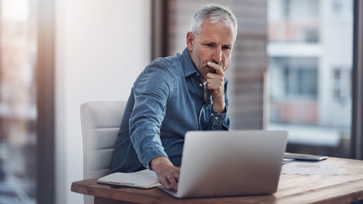 a man using a laptop computer