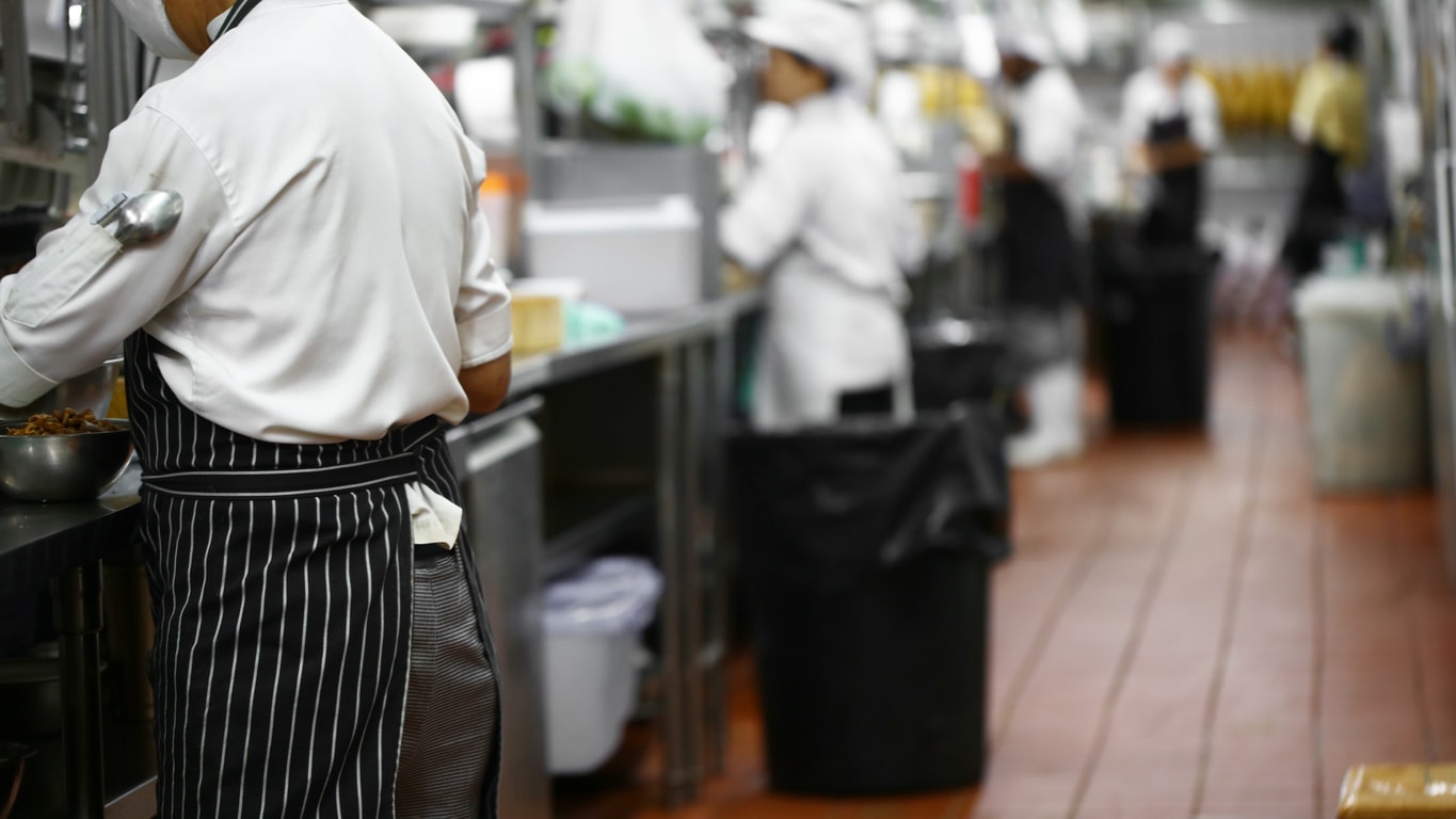 Food workers in a kitchen.