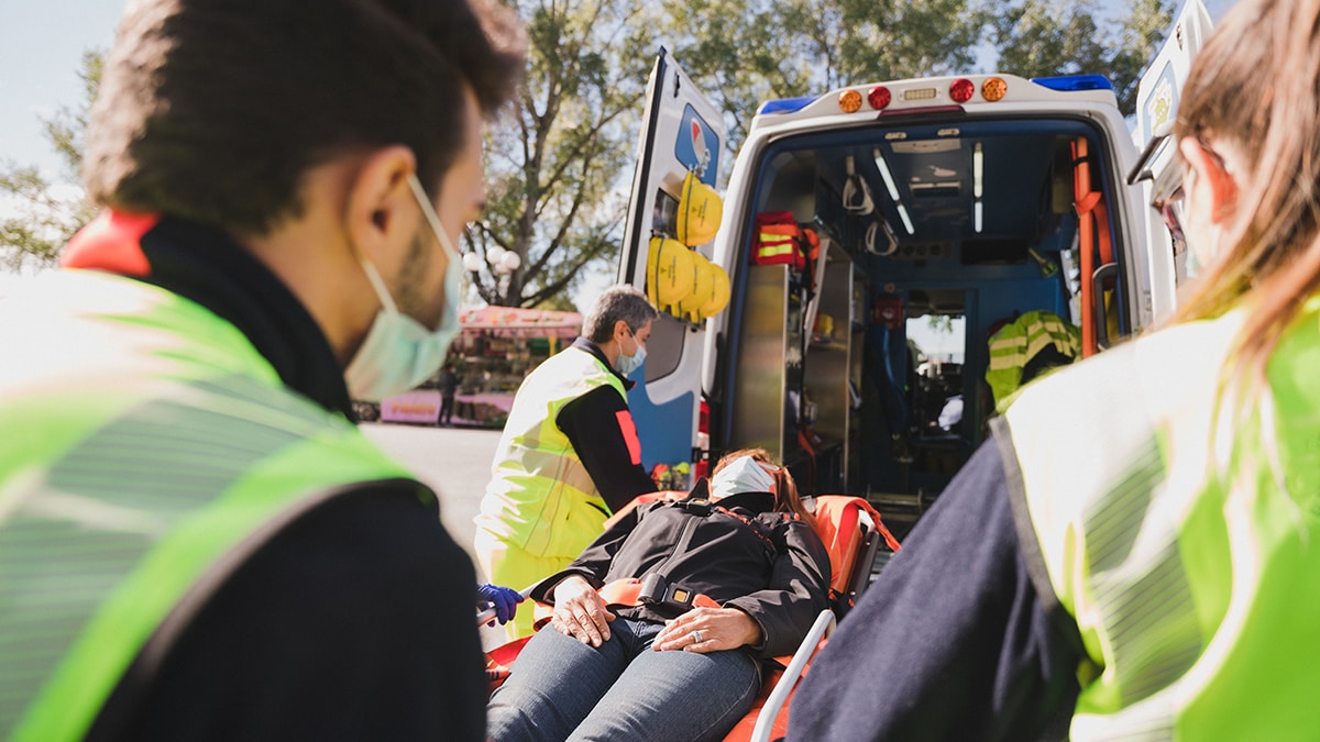 An ambulance and EMT technicians.