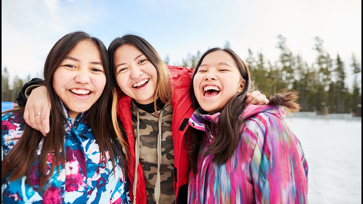 Group of smiling teen girls