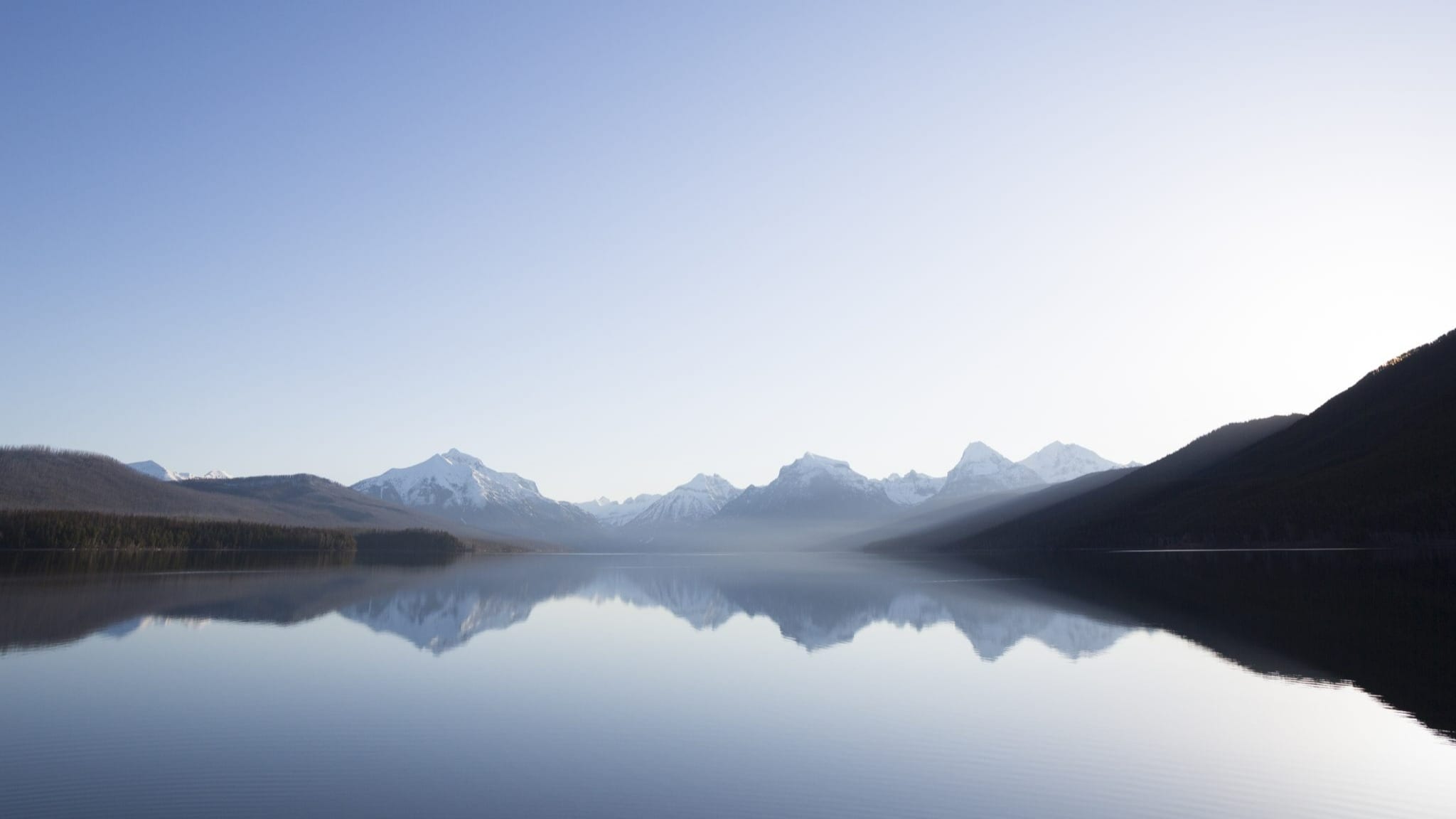 A reflective image of the sky over a lake for the Tribal Affairs (OTASA) Image.